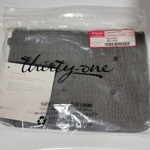 New in package- Thirty-One's Grey Crocodile Rubie Mini.